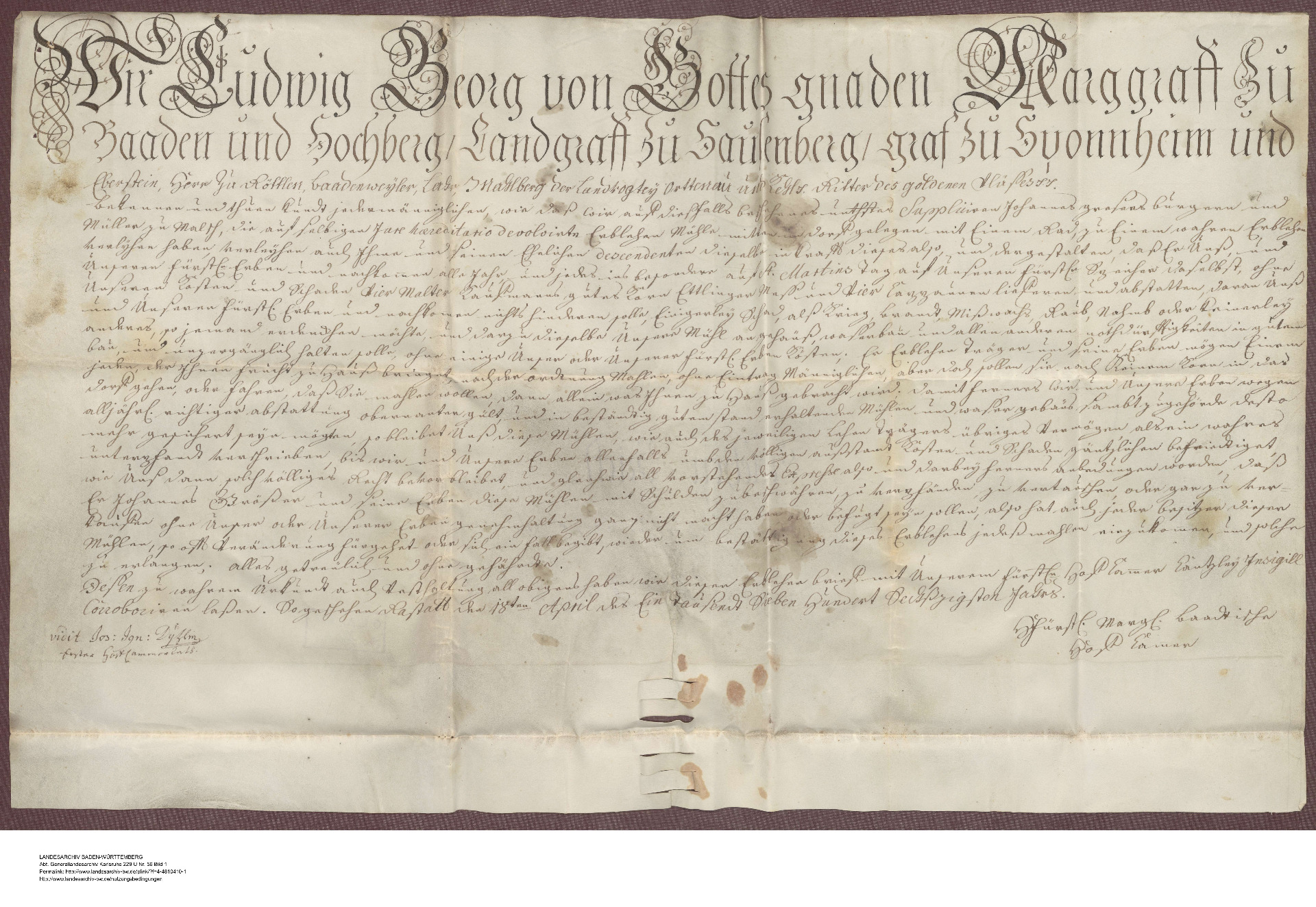 Lehensurkunde des Markgrafen Ludwig Georg (1702-1761), Sohn von Sibylla Augusta und Ludwig Wilhelm/Türkenlouis), wegen seiner Jagdtleidenschaft hieß er im Volk "der Jägerlouis". Die Urkunde besagt, dass Johannes Gräßer jedes Jahr zu St.Martin die erforderlichen Kosten zur Deckung der Mühle an den Herrscher zu zahlen habe, die Mühle vor jedem Schaden zu bewahren, keine Schulden machen und nichts verpfänden dürfte. "So geschehen Rastatt den 1Sten April des eintausend sieben hundert sechzigsten Jahr ., GLA K229 U Nr. 56, Bild 1